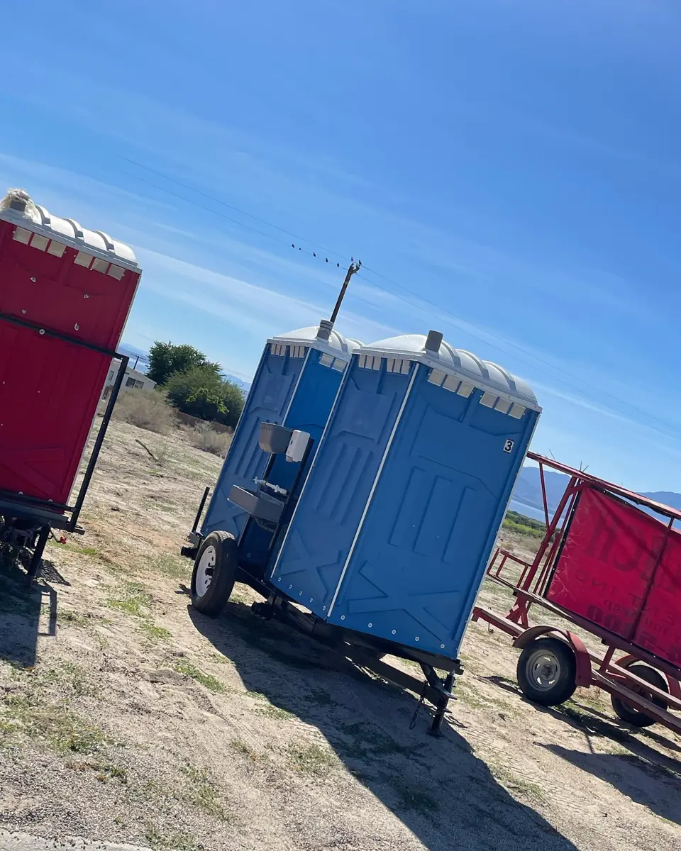 Trailer-mounted portable units parked in a field