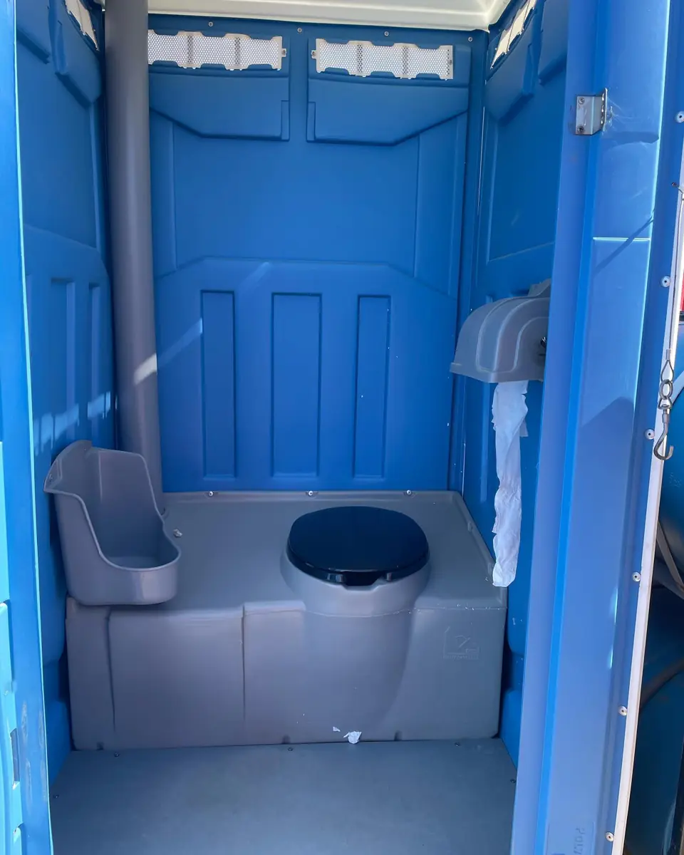 Freshly serviced porta potty interior